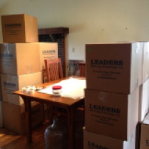 Boxes lined up in dining room