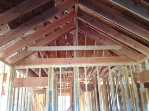 Board where the flat part of the vaulted ceiling would go in the master bedroom.