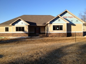 The front Hardie cement board installed on the front of the house