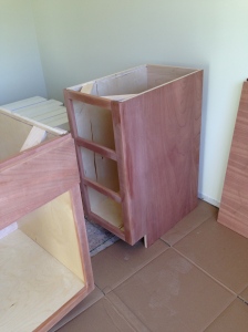Three drawer cabinet in the island before stain
