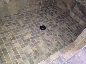 Second day, Casey finished the floor of the shower