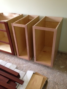 My KitchenAid mixer lift cabinet (on the right) and small cabinet for cutting boards (on the left)