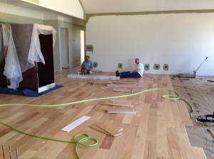 Installers taking a lunch break. Looking toward the family room from the kitchen/dining area